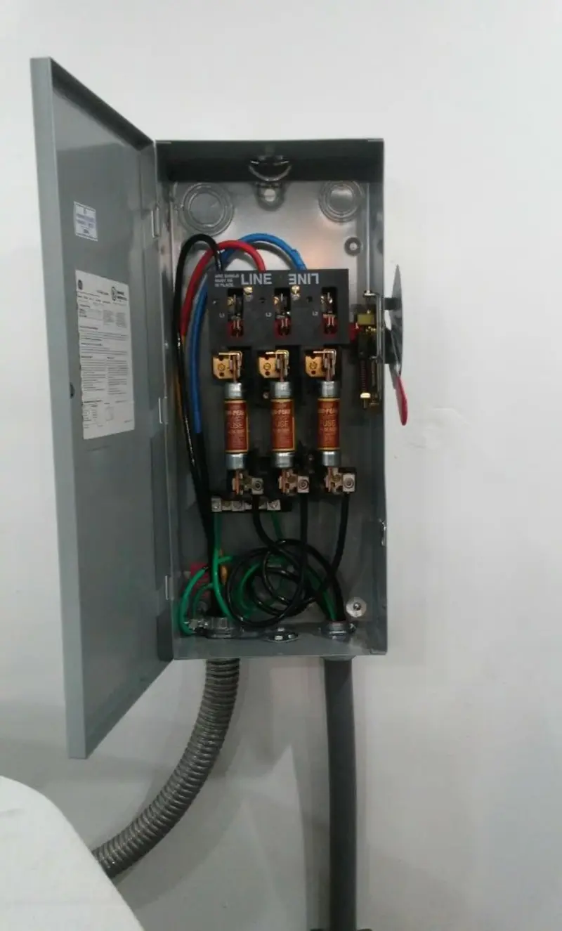 Three-phase disconnect switch installed for Smoke Detector Installation in St. Peter